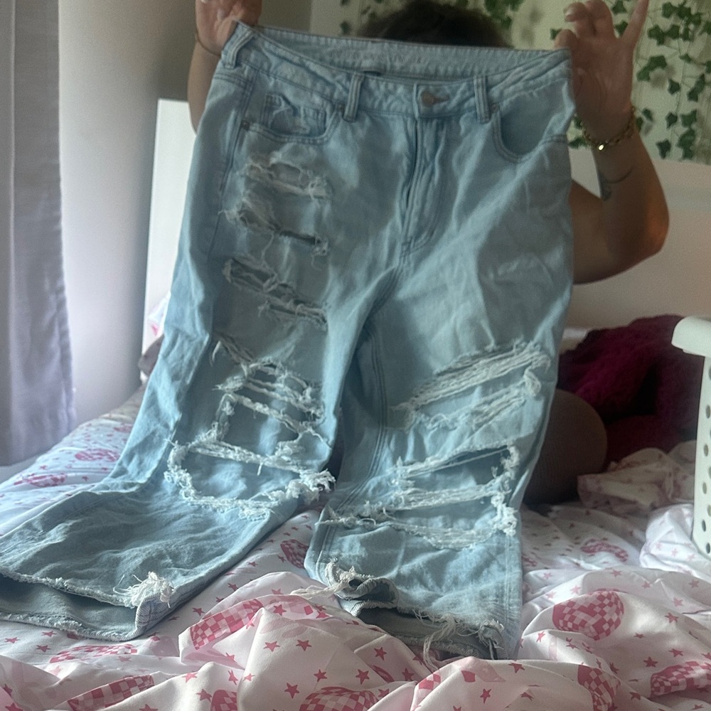 Distressed Light Blue Strigid American Eagle Skinny Jeans